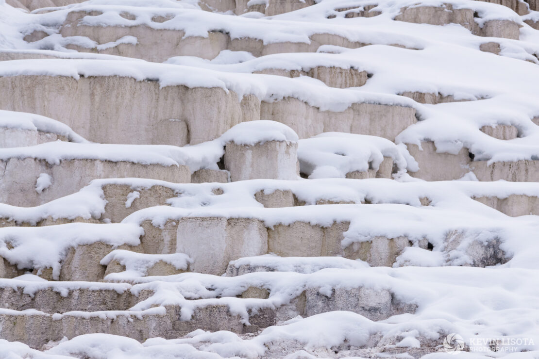 Snow-covered travertine terraces at Mammoth Hot Springs