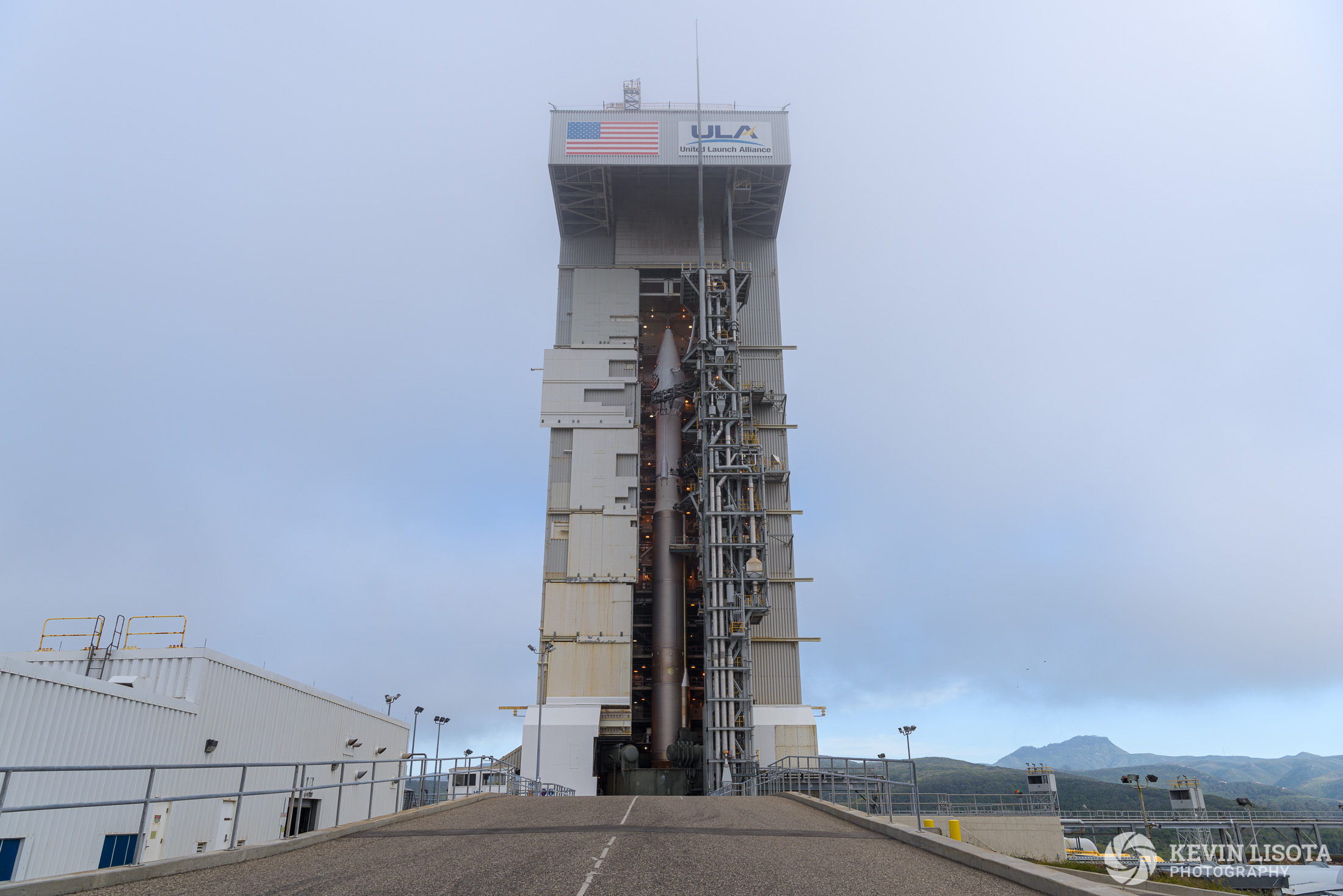 Atlas V rocket awaits launch of Mars InSight inside servicing tower