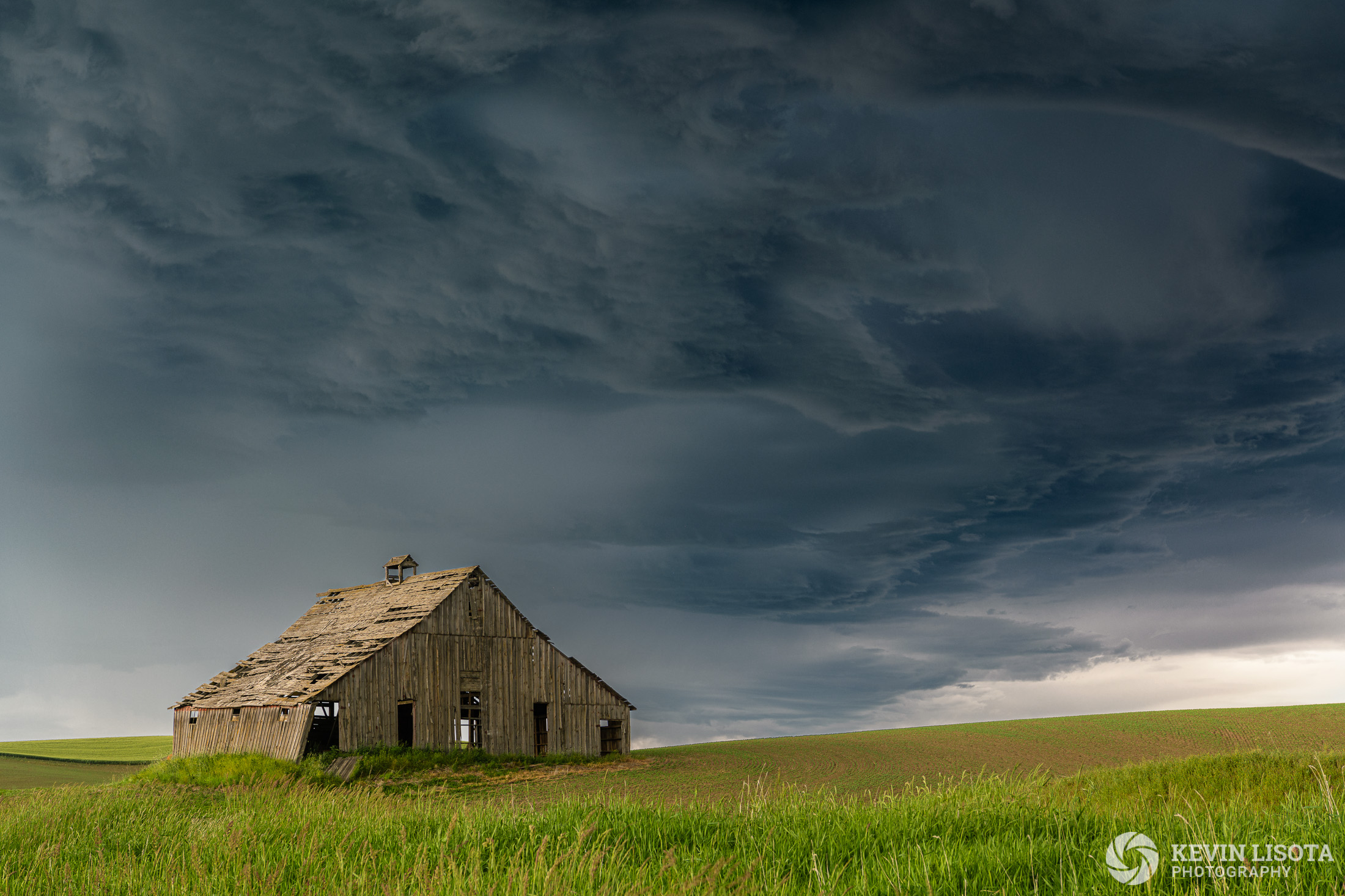 Old barn at Ladow Butte during a thunderstorm